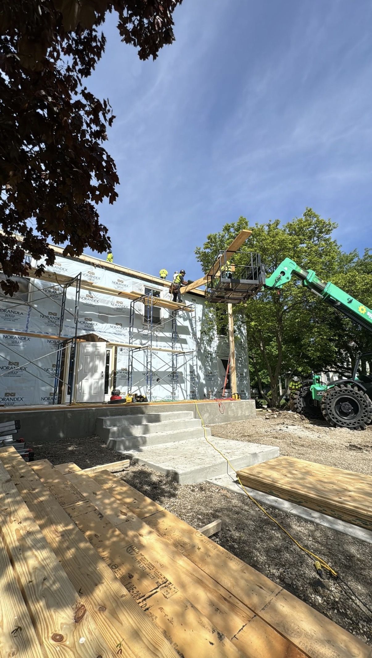 Crew framing the new front dormer on the Zeta Tau Alpha sorority house in Normal, Illinois